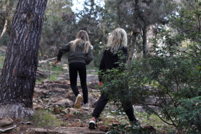 Pair of campers in forest